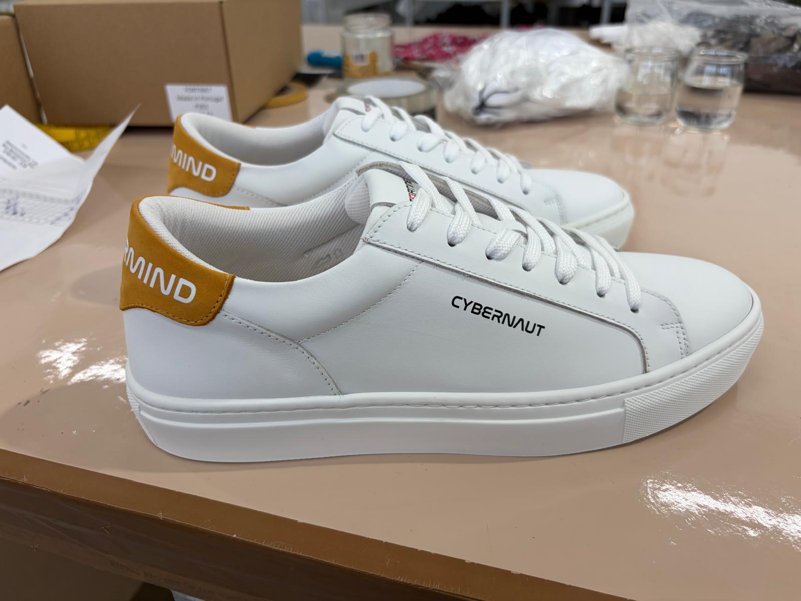 Fortinet Mastermind custom sneaker heel detail with mustard suede tab